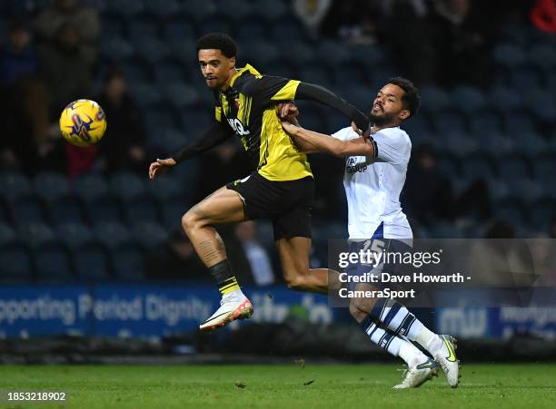 Preston North End's Duane Holmes battles with Watford's Jamal Lewis during the Sky Bet Championship match between Preston North End and Watford at...
