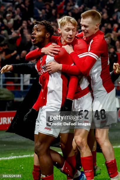 George Ilenikhena of Royal Antwerp FC scores the 3:2 and celebrate the goal with his team mates during the UEFA Champions League match between Royal...
