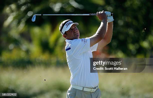 Jason Bohn watches his approach shot on the tenth hole during the second round of the Shriners Hospitals for Children Open at TPC Summerlin on...