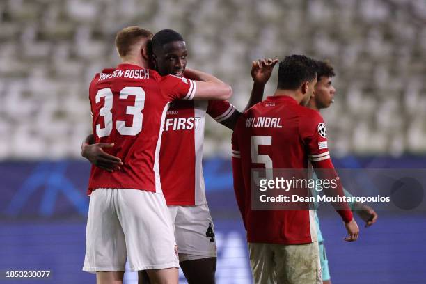 Zeno Van Den Bosch and Soumaila Coulibaly of Royal Antwerp celebrate following the team's victory during the UEFA Champions League match between...