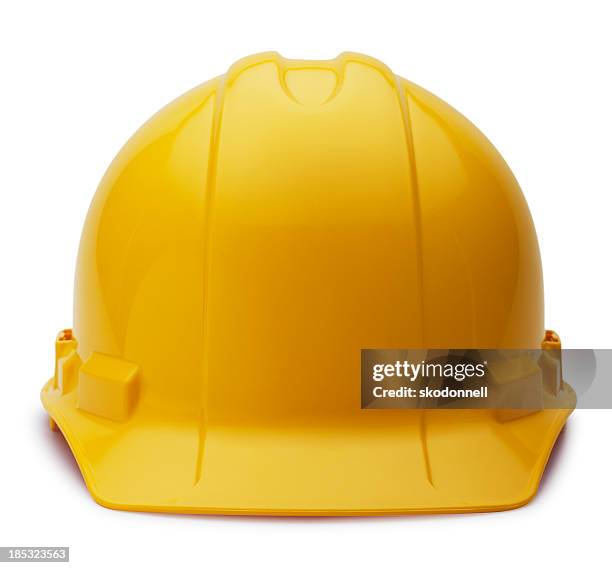 casco de construcción sobre blanco - casco de trabajo fotografías e imágenes de stock