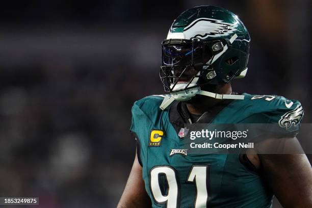 Fletcher Cox of the Philadelphia Eagles looks on from the field during an NFL football game against the Dallas Cowboys at AT&T Stadium on December...