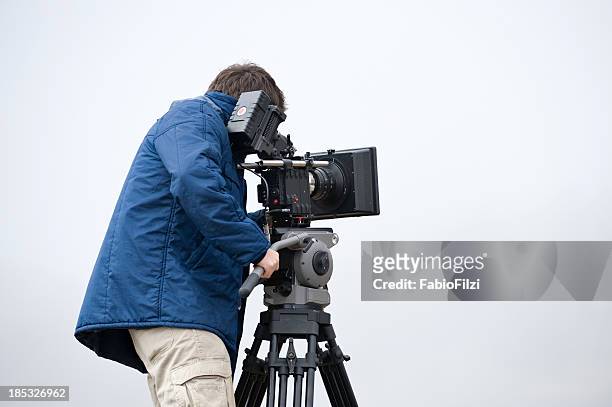 professional video cameraman - film director stock pictures, royalty-free photos & images