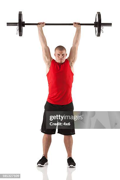 man exercising with barbells - sleeveless stock pictures, royalty-free photos & images