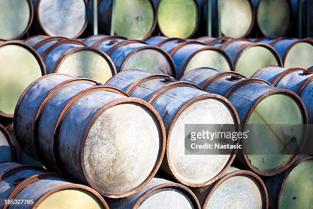 petrol barrels - oil barrels stock pictures, royalty-free photos & images