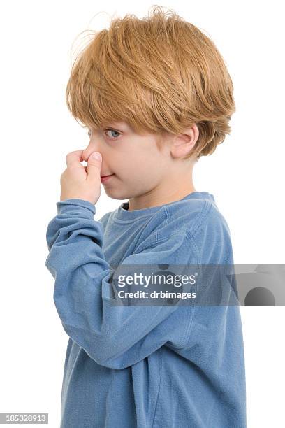 little boy pellizcar nariz - farting fotografías e imágenes de stock