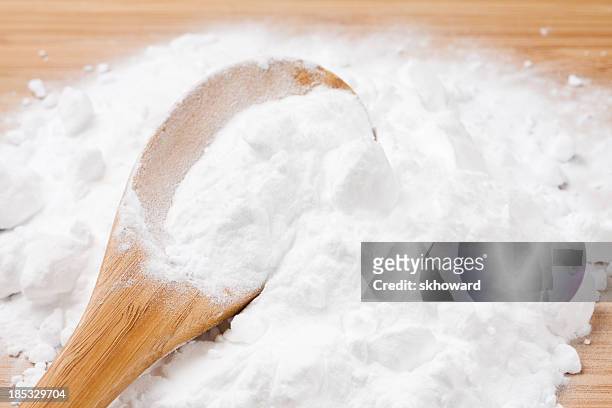 baking soda with wooden spoon - baking powder stock pictures, royalty-free photos & images