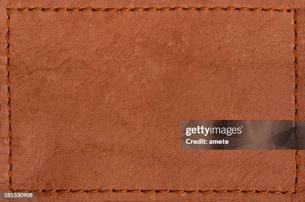 blank leather jeans label isolated on white background - stiksel stockfoto's en -beelden