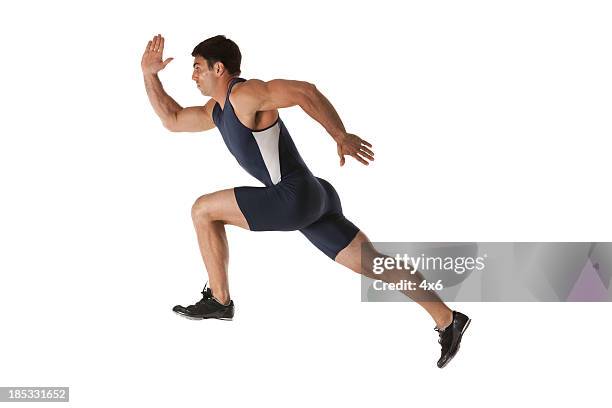 male athlete running - running man profile stock pictures, royalty-free photos & images