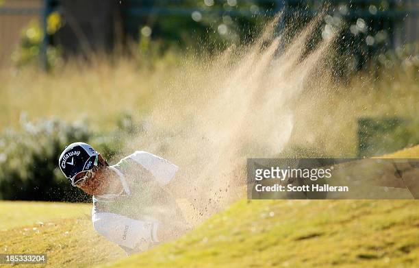 Ryo Ishikawa of Japan hits a fairway bunker shot on the tenth hole during the second round of the Shriners Hospitals for Children Open at TPC...