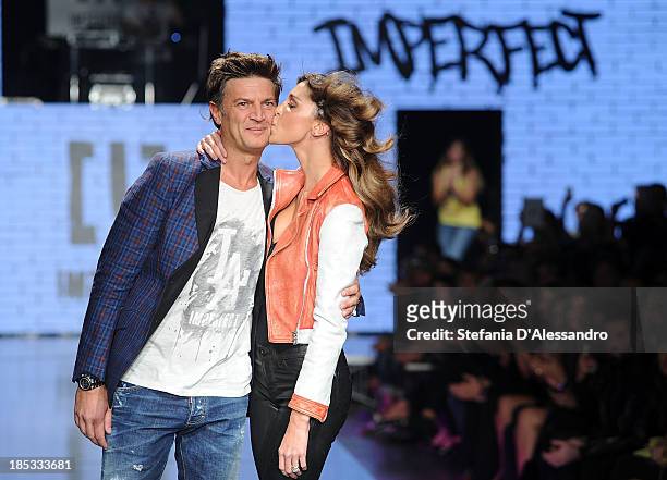 Fabio Castelli and Belen Rodriguez attend Imperfect Spring/Summer 2014 Fashion Show on October 18, 2013 in Milan, Italy.
