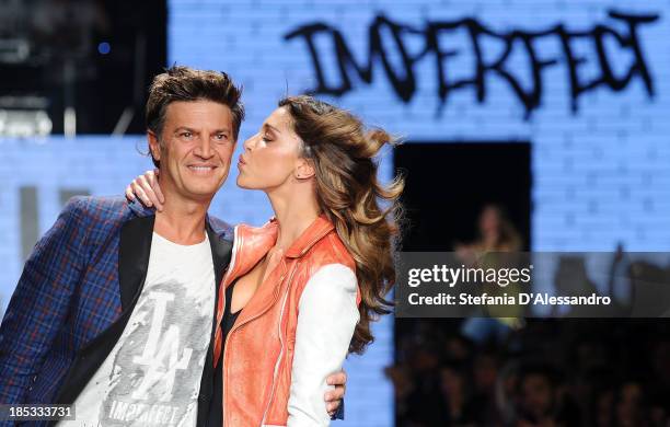 Fabio Castelli and Belen Rodriguez attend Imperfect Spring/Summer 2014 Fashion Show on October 18, 2013 in Milan, Italy.