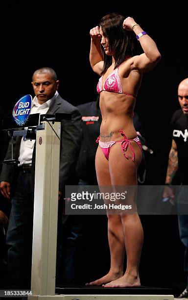 Jessica Eye weighs in during the UFC 166 weigh-in event at the Toyota Center on October 18, 2013 in Houston, Texas.