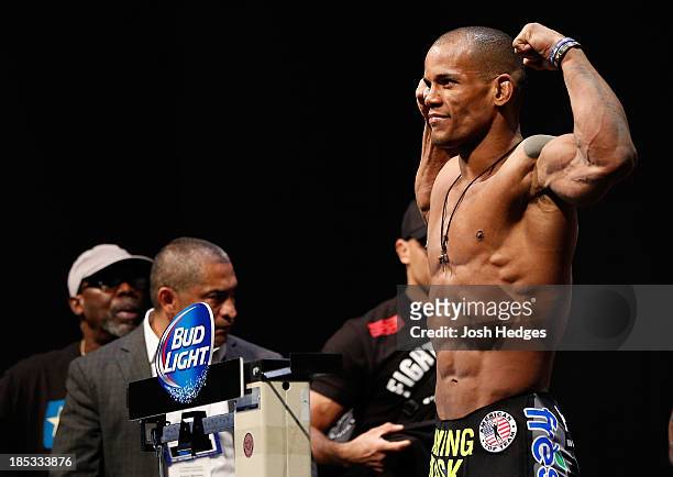 Hector Lombard weighs in during the UFC 166 weigh-in event at the Toyota Center on October 18, 2013 in Houston, Texas.