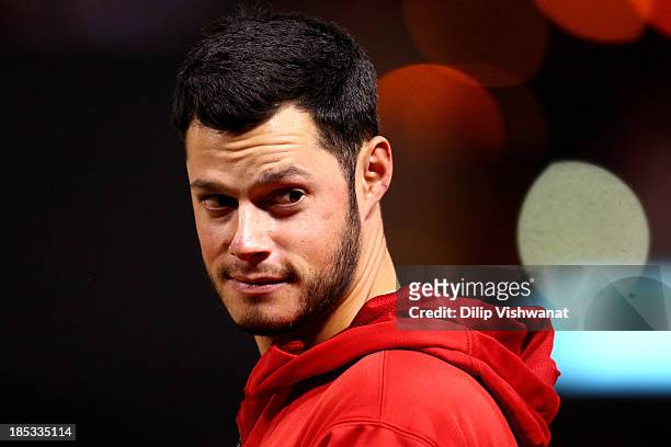 Joe Kelly of the St. Louis Cardinals stands on the field across from Scott Van Slyke of the Los Angeles Dodgers before the start of Game Six of the...