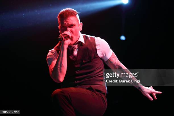 Brent Smith of Shinedown performs on stage at Wembley Arena on October 18, 2013 in London, England.