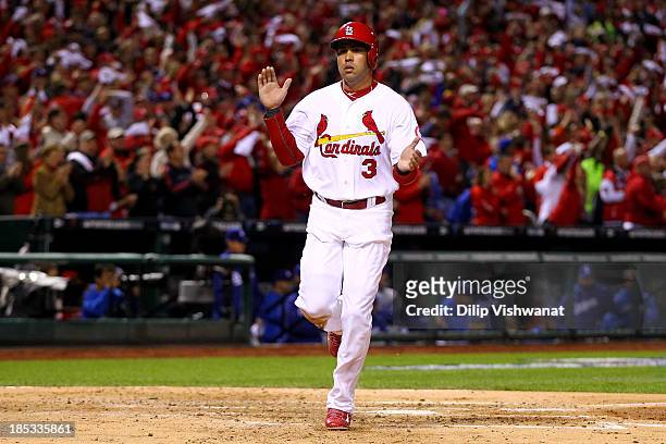 Carlos Beltran of the St. Louis Cardinals celebrates after scoring a run in the third inning while taking on the Los Angeles Dodgers in Game Six of...
