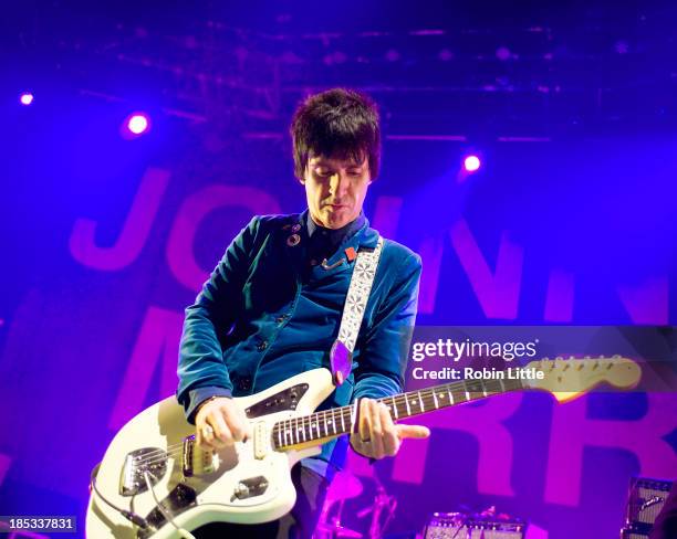 Johnny Marr performs on stage at The Roundhouse on October 18, 2013 in London, England.