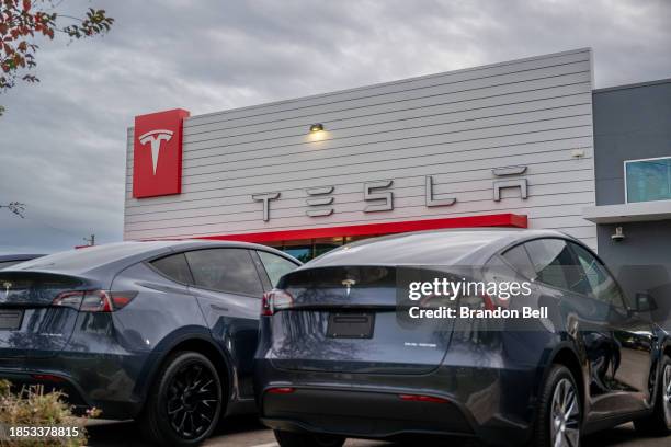 Tesla dealership is seen on December 13, 2023 in Austin, Texas. Tesla is recalling nearly all vehicles sold in the US after a near two-year...