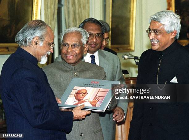 Indian President K.R. Narayananan releases a book on Communist Party leader late E.M.S. Namboodiripad to former Prime Minister Inder Kumar Gujral at...