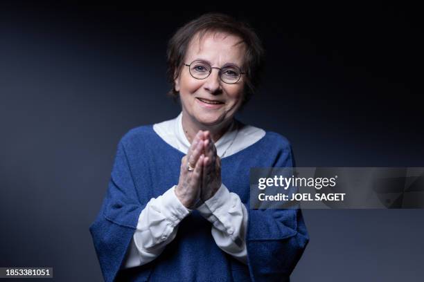 French singer and musician Marie-Paule Belle poses during a photo session in Paris on December 15, 2023. Three years late due to the health crisis,...