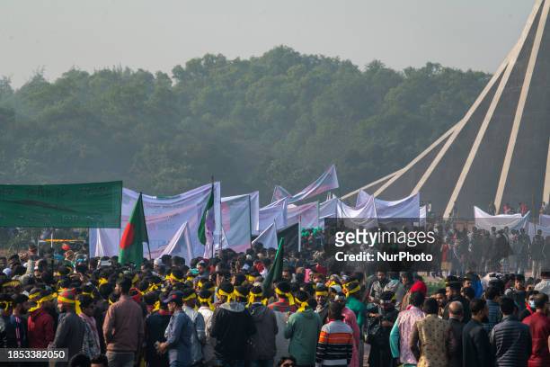 People are gathering to pay their respects at the 1971 Independence War's Martyrs National Memorial to celebrate the 52nd Victory Day, which marks...