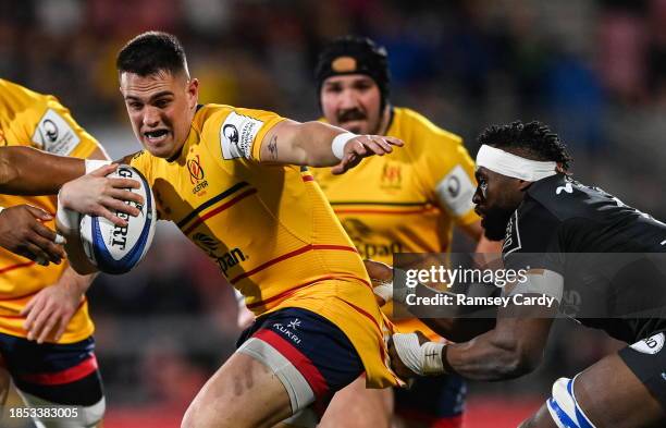Belfast , United Kingdom - 16 December 2023; James Hume of Ulster is tackled by Siya Kolisi of Racing 92 during the Investec Champions Cup Pool 2...