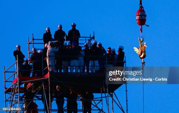 Golden Rooster Returned To Cathedral Perch at Notre-Dame Of Paris on December 16, 2023 in Paris, France. Recovered from the rubble of the fire,...