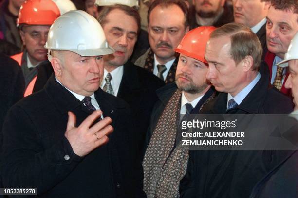 Moscow Mayor Yuri Luzhkov chats with Acting President Vladimir Putin about Moscow subway development at the new metro station Academician Yangel...