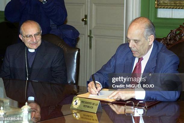 The archbishop of Montevideo Nicolas Cotugno , who presides at the Peace Commitee, participates the first meeting next to Uruguayan President Jorge...