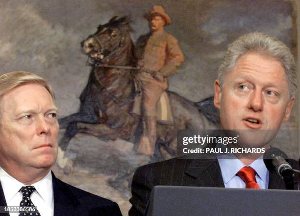 House of Representatives Minority Leader Richard Gephardt looks towards US President Bill Clinton during an event highlighting the need for...