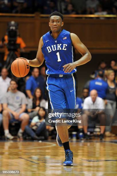 Jabari Parker of the Duke Blue Devils dribbles up court during Countdown to Craziness at Cameron Indoor Stadium on October 18, 2013 in Durham, North...
