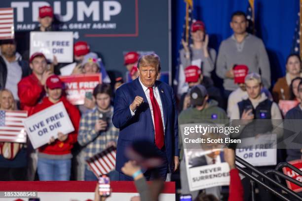 Republican presidential candidate, former U.S. President Donald Trump greets supporters during a campaign event at the Whittemore Center Arena on...