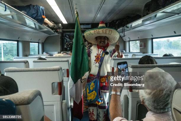 Passengers on the Maya Train near Campeche, Mexico, on Saturday, Dec. 16, 2023. Mexican President AMLO's flagship works have significantly exceed...
