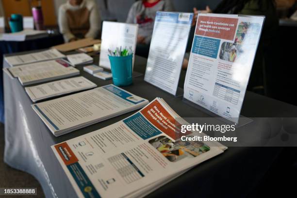 Informational brochures on Medicaid expansion during an event held by New Hanover County Department of Health and Human Services at a library in...