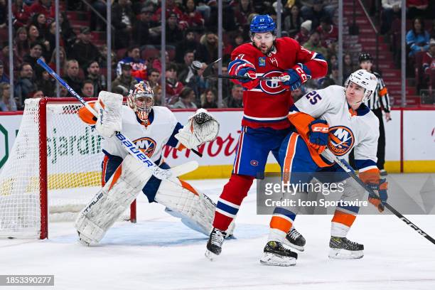 Montreal Canadiens right wing Josh Anderson deviates a shot on New York Islanders goalie Semyon Varlamov during the New York Islanders versus the...