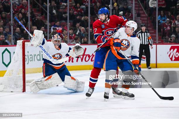 New York Islanders goalie Semyon Varlamov makes a save against Montreal Canadiens right wing Josh Anderson during the New York Islanders versus the...