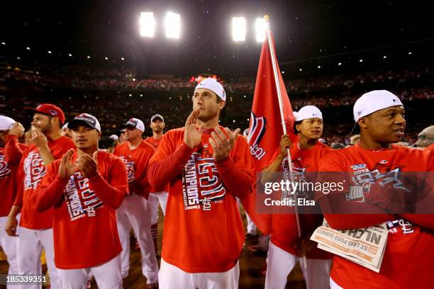 David Freese of the St. Louis Cardinals celebrates after the Cardinals defeat the Los Angeles Dodgers 9-0 in Game Six of the National League...