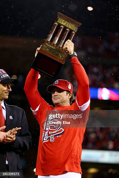 Manager Mike Matheny of the St. Louis Cardinals celebrates after the Cardinals defeat the Los Angeles Dodgers 9-0 in Game Six of the National League...