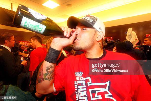 Yadier Molina of the St. Louis Cardinals celebrates after the Cardinals defeat the Los Angeles Dodgers 9-0 in Game Six of the National League...