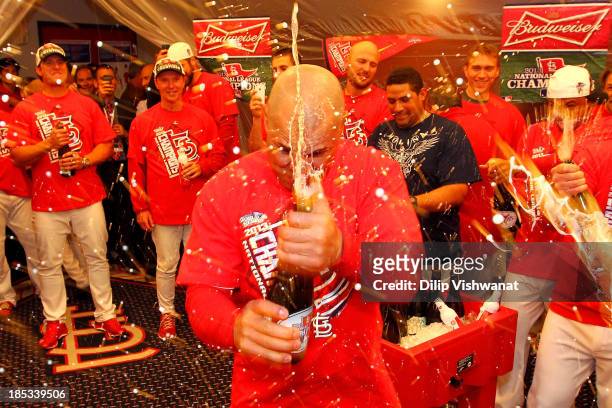 Carlos Beltran of the St. Louis Cardinals celebrates after the Cardinals defeat the Los Angeles Dodgers 9-0 in Game Six of the National League...