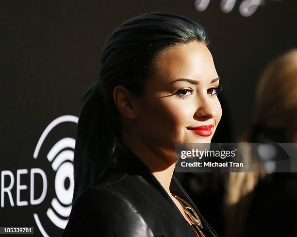 Demi Lovato arrives at the launch of the Redlight Traffic APP - Dignity Gala held at The Beverly Hilton Hotel on October 18, 2013 in Beverly Hills,...