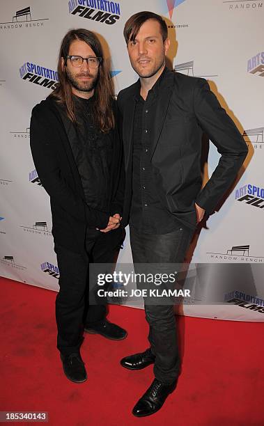 Director Jason Banker , and editor Jorge Torres-Torres arrive for the opening of Elijah Wood's movie Toad Road at the Arena Cinema on October 18,...