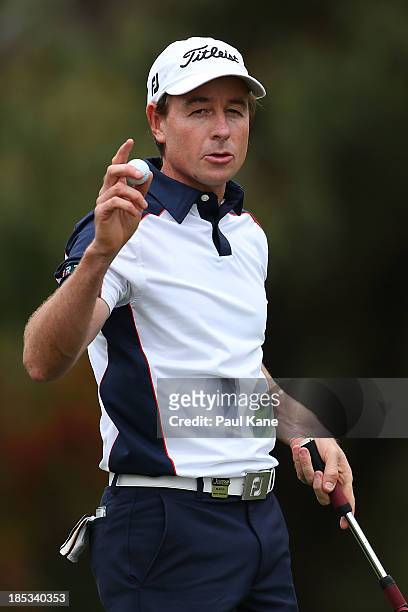 Brett Rumford of Australia acknowledges the gallery after finishing his round during day three of the Perth International at Lake Karrinyup Country...