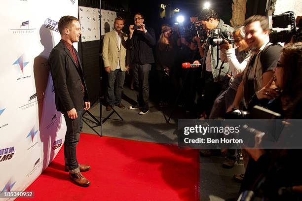 Actor Elija Wood attends the premiere of "Toad Road" at Arena Cinema Hollywood on October 18, 2013 in Hollywood, California.