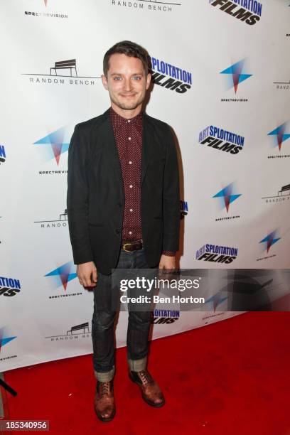 Actor Elija Wood attends the premiere of "Toad Road" at Arena Cinema Hollywood on October 18, 2013 in Hollywood, California.