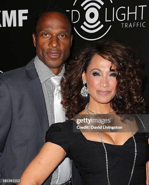 Former NFL player Willie Gault and wife actress Suzan Brittan attend the launch of the Redlight Traffic app at the Dignity Gala at The Beverly Hilton...