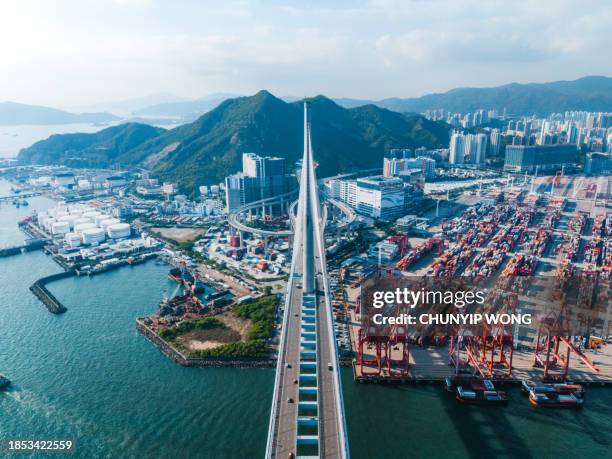 aerial view of stonecutters bridge and the tsing sha highway, hong kong - hong kong stock pictures, royalty-free photos & images