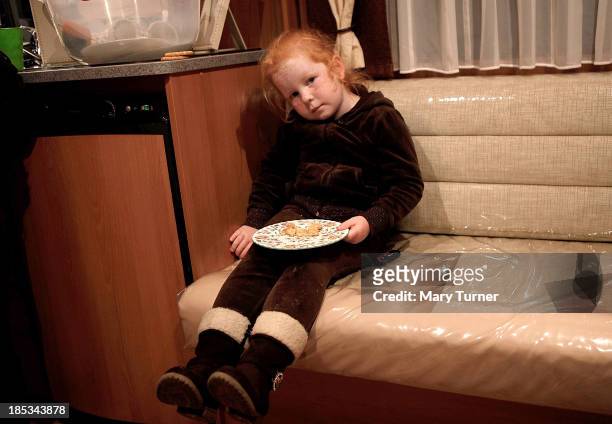 Tiffany O'Brien, poses for a photograph in her family's trailer, on the road outside the Dale Farm site on October 18, 2013 in Crays Hill, England....