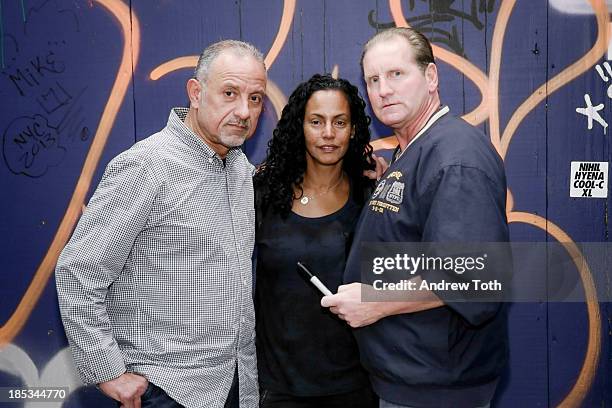 Snake 1 , Rocky 184 and Mike 171 pose for a photo during the "Write Of Passage" New York City Graffiti Art Exhibition at Red Bull Studios New York on...